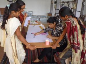 Sonica Sarna works with students at The Handloom School