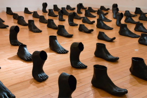 Ceramic sculptures of feet with wax, water, and salt.