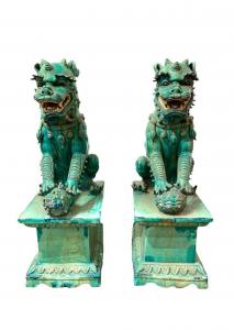 Large pair of Chinese turquoise glaze terracotta foo dogs on stands, 42 inches tall ($5,842)