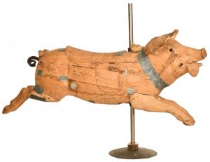 Early wood pig carousel, not marked and not painted, so one can see all the seams and cracks, with a hollow body, rated 6.5.