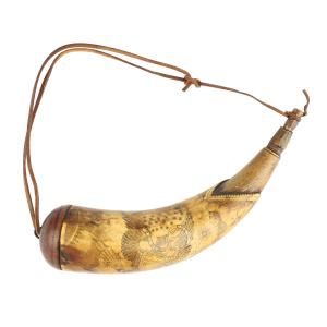 Signed John Tansel (Kentucky, 1800-1872) powder horn, carved with a federal eagle with shielded breast (CA$22,420).