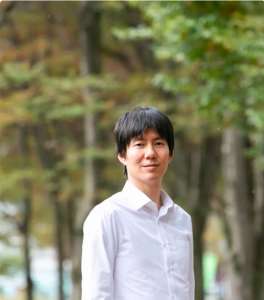 Founder of Socious Mr Seira Yun standing