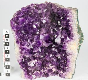 Large amethyst cavern geode, containing large deep purple amethyst crystals from ½ inch to 3 inches across, 15 inches by 18 inches (est. $2,000-$3,000).