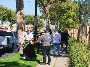 Making the streets of Commerce spotless in an environmental initiative organized by Bridge Publications