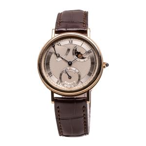 Circa 1996 Breguet Classique Swiss watch with 19kt yellow gold case and a dial featuring a power-reserve indicator and phases of the moon (est. CA$30,000-$40,000).