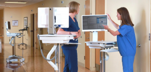 Clinician using Altus-Inc portable workstation