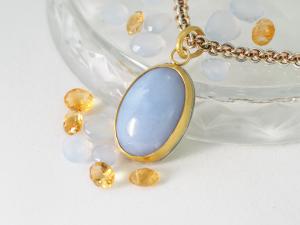 Blue stone with gold setting