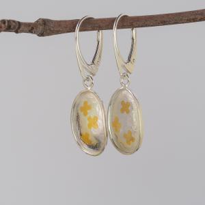Gold and silver drop earrings