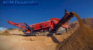 Huge Mining Machine in dunes where it digs