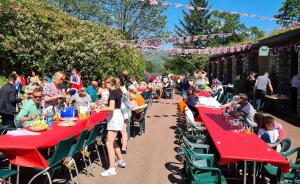 Party mood: guests at Skelwith Fold stage a street party on the park to mark the Queen’s Platinum Jubilee