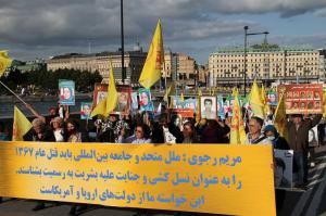 Iranians Chanted: “MOIS Mercenary, Get Lost!”, “Murderer of Abadan, Your Trial Is Coming”, “Mullahs’ Embassy, This Spy Den Must Be Shut Down”For the second day, a large number of Iranians gathered this morning outside a courthouse in Stockholm.