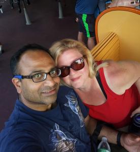 The image shows the couple, Natalie and Sanat Ranganathan of Chicago, IL. They are sharing the news about launching a joint online business and plan to expand support for charitable causes in their community.