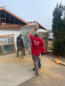 carrying materials into a home being remodeled