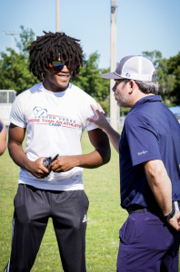 Jaydon Hodge speaking to Your Brand Voice Founder Bryan Bruce at his inaugural More Than An Athlete Camp.