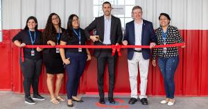 EPS Global Brazil team cutting the ribbon on new secure programming center