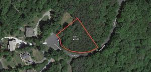 .68 +/- acre wooded lot in the Stripers Landing Community of Smith Mountain Lake