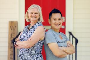 Lynn Talbott, CEO, and Founder of HR Biz with Michael Ly, CEO of Reconciled standing back to back