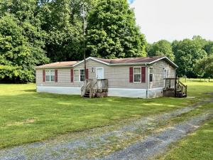 3 BR/2 BA manufactured home (2000 year model) on .75 +/- acres and an adjacent .70+/- acre vacant lot in Mt. Solon Augusta County, VA