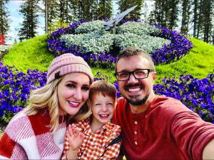 Family in front of 18' Floral Clock