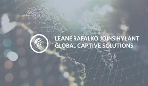 Gray world map with white text overlay - "Leane Rafalko joins Hylant Global Captive Solutions."