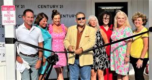 County Commissioner, Mike Forte cuts the Official Ribbon at CENTURY 21 Collective's opening. Photo: Co-Owners Stephen Votino, Lisa: Myers, Lindsey Jenkins, Commissioner Forte, Marguerite Greene, Stephen Votino and Lindsey Jenkins, and Michelle Robson.