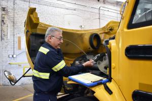 Fernando Magana performing diagnostics on a school bus at the Company’s Aurora, Illinois facility