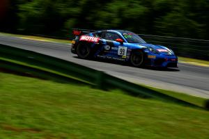 a race car on an asphalt road
