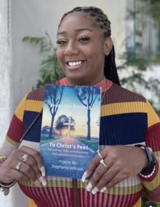 Author Stephanie Jeffcoat holds her new book