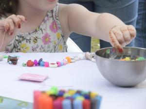 Children created one-of-a-kind necklaces and bracelets.