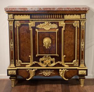 Henri Picard (French, active 1831-1864) ormolu parquetry commode in the Regence taste, 60 inches tall by 58 ½ inches wide, with a rectangular rouge marble top and burl walnut inlaid case.