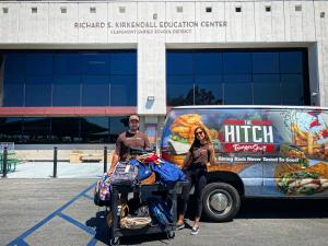 Hitch Burger and Project Boon deliver backpacks to the Claremont Unified School District