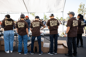 Volunteers at Eat & Be Well prepare to serve their community