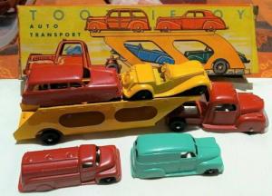 Tootsietoy car carrier set #207 from 1955 with the original box and including four vehicles. The set shows some signs of wear but still should go for $1,000-$5,000.