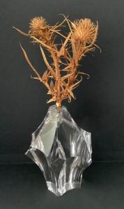 Steuben crystal vase with a 24kt gold vermeil (gold-plated silver) thistle weed finial, 4 inches tall minus the finial (est. $2,000-$5,000).