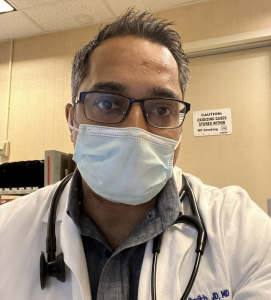 Dr. Naval Parikh at work with mask