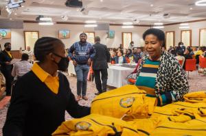 A new graduate picking up her accolade