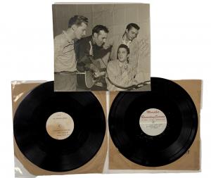 Items pertaining to Elvis Presley’s early career at Sun Records: two acetate records and a photo signed by the ‘Million Dollar Quartet’ – Presley, Johnny Cash, Carl Perkins and Jerry Lee Lewis – and inscribed to Sun Records employee Marion Keisker MacInnes.