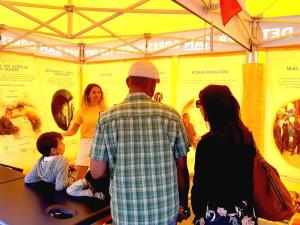 Throughout the summer, the bright yellow Scientology Volunteer Ministers tent provided help and practical tools in Aarhus, Denmark.