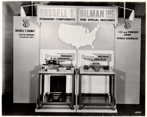 Black and white photo of manufacturing slides and spindles sold in 1950s by Russell T. Gilman Inc