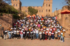 Educators Cheering and posing for a group shot after a successful training workshop
