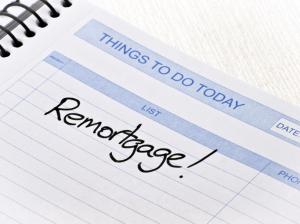 Things to do today notepad with Remortgage! written in black pen.