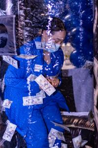 Whether dusting off one’s resume, re-entering the job market after a slump, or a recent graduate bracing for that first interview, there was something for everyone.  Here a Gurnick Academy student stands in one employer's money tank.