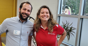 Mariel Bouffier, new team member, pictured on the right next to speed marketing event attendee.