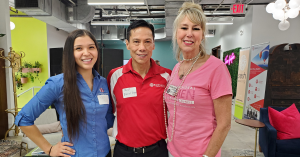 Del Balbin, new team member, pictured in the center, next to speed marketing event attendees.