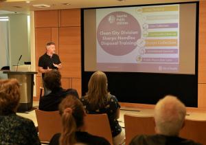 Michael Eggers, Clean City Inspector with Seattle Public Utilities, briefed those attending the forum on the city’s program to prevent the spread of HIV and other diseases by disposing of syringes and other sharps.