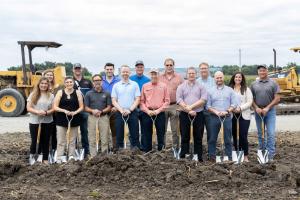 Photograph of employees from Kalmbach Feeds ground breaking for new laboratory.
