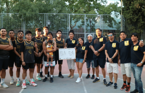 Winning team of Pinoy Basketball Tournament in Madrid poses with the game's sponsor