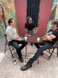 Ben DeJesus (Center) is an Emmy and Tony-nominated director, producer, writer and co-founder of NGL Studios with his partner John Leguizamo (Left) .