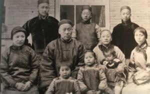 This old photography shows Chinn's great-grandmother (born c.1850) who, as a young child, was discovered in a church lying next to her deceased mother. A Southern Baptist missionary rescued and adopted her, naming her Mary Hartwell (2nd Row, 2nd from right)