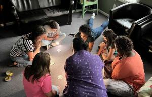 LearningRx group session with students huddle together with trainers